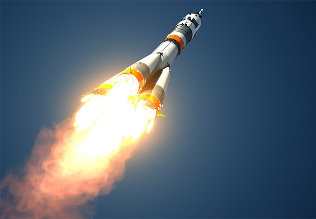 rocket launching through air