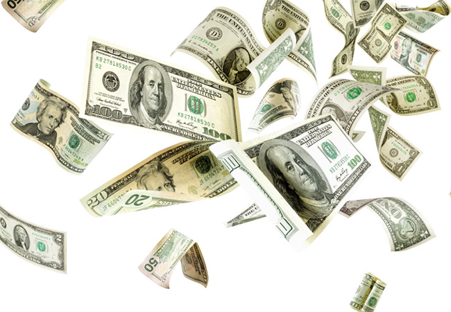money mid-air falling to ground